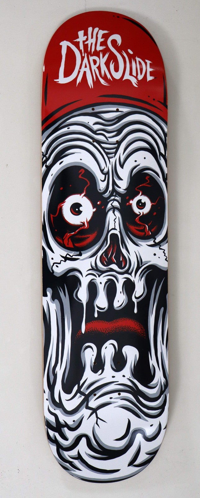The Dark Slide X Tim Baron "Ghoul Skull" Skateboard Deck